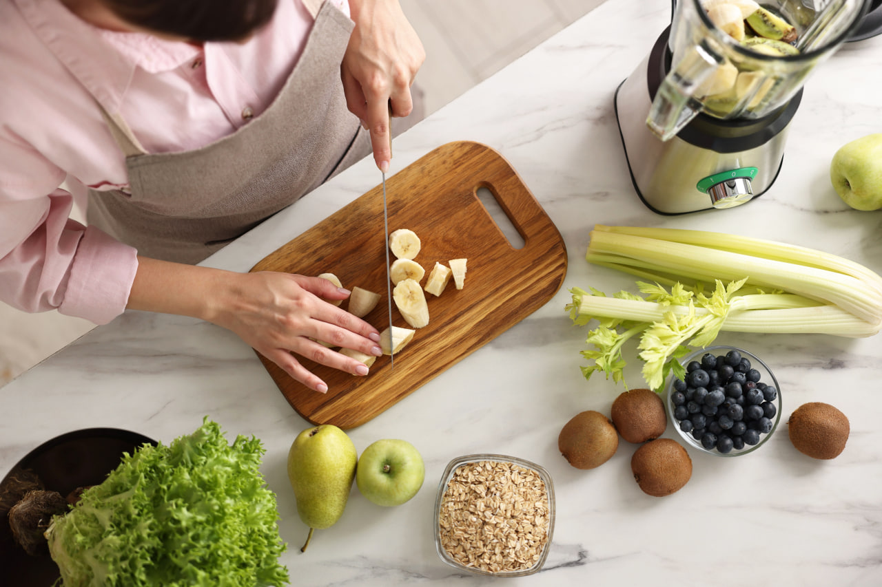 Illustration of a kitchen table with fresh, colourful food representing the Balanced Table team